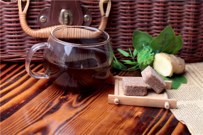 健康な固体飲み物の女性のためによい赤砂糖が付いている自然なショウガの茶